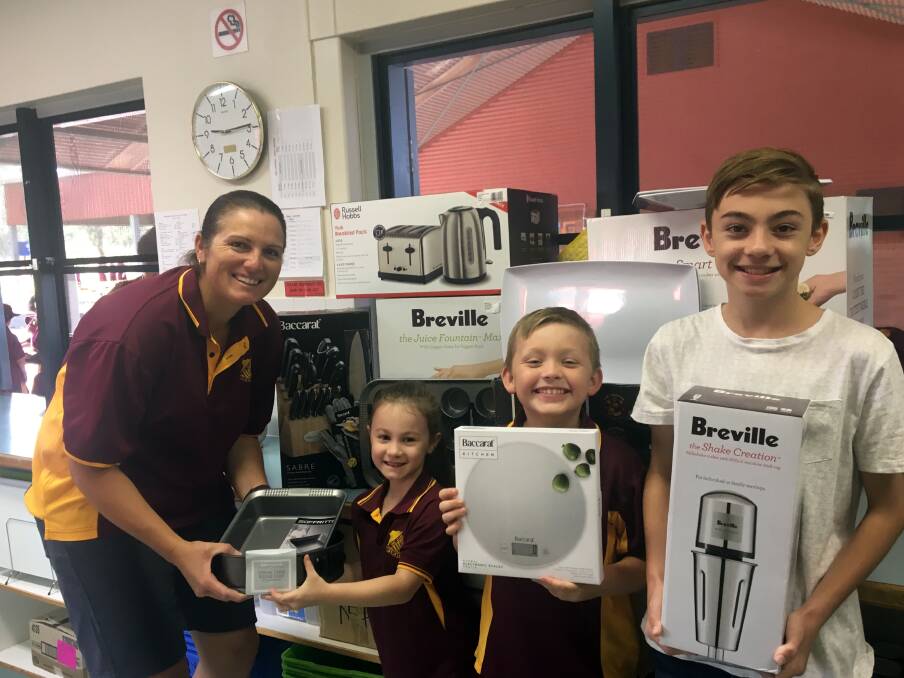 BIG BUYS: Canteen manager Renee Mumford, Khloe Betts, Kalan Perkins and Aiden Perkins with just some of the items the P&C was able to purchase.
