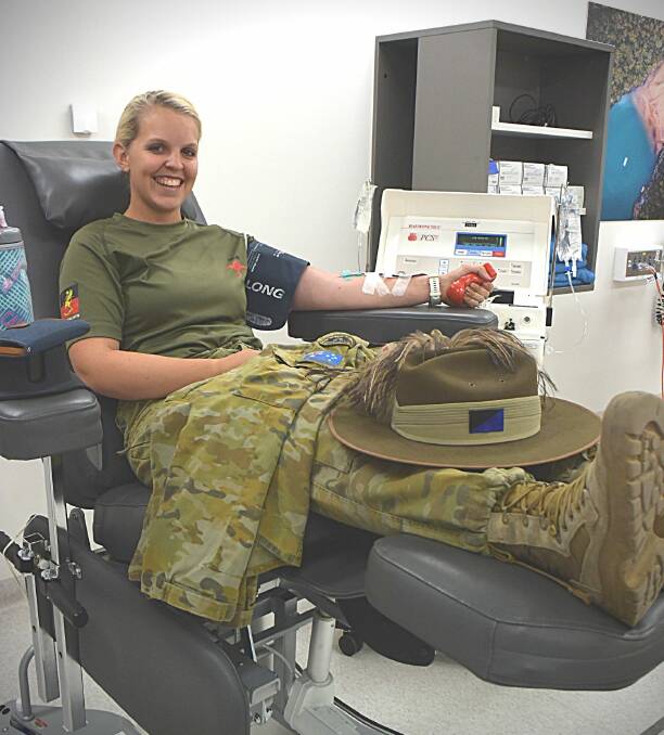 GIVING TYPE: 12th/16th light cavalry scout Sara Spokes donated plasma during the drive today. Photo: Carolyn Millet 011119CMA02