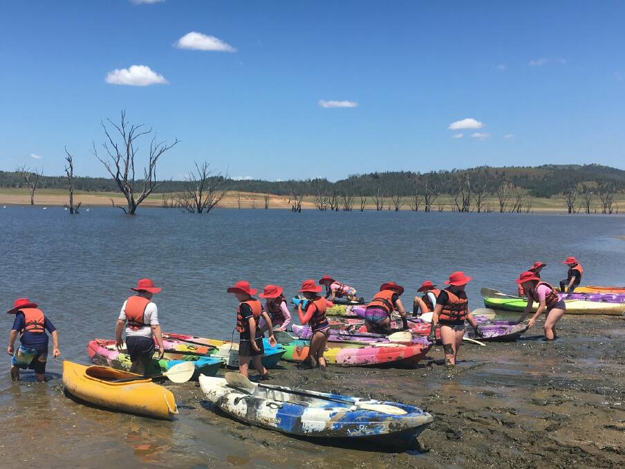 Hitting the water: Gunnedah South Public School kids had a great time on the water yesterday. The low water levels have revealed not only natural features such as sand banks, but also 'lost treasures' such as car keys and fishing lures.