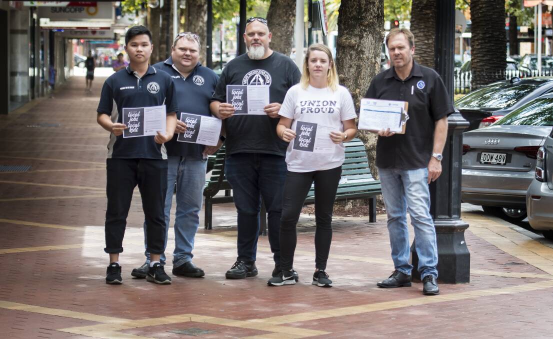 NOT ON: Meatworkers' union reps James Drinkwater, Jason Roe, Justan Smith, Amanda Harvey and Grant Courtney in Tamworth. Photo: Peter Hardin 140318PHB022