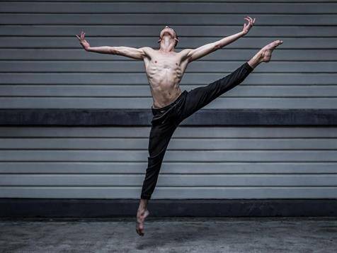 STRETCH: Izzac Carroll extends himself with seven hours a day of dance training.