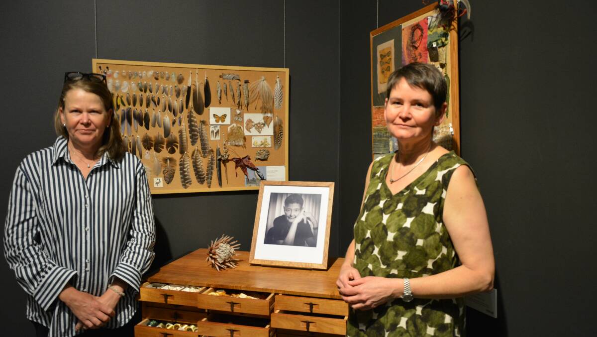Judy Wilford's daughters Meg and Naomi with some of the treasures collected over their mothers life which make up part of the collection in the exhibition A Stitch In Time.
