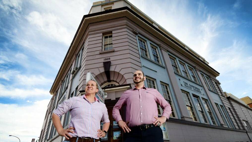 PRIDE: Architect Jodie Farrell and Lionheart Property Development director Mark Sleiman outside the old building, which dates to 1925 and is on the corner of Brisbane and Marius Streets. They plan a bar in the basement.