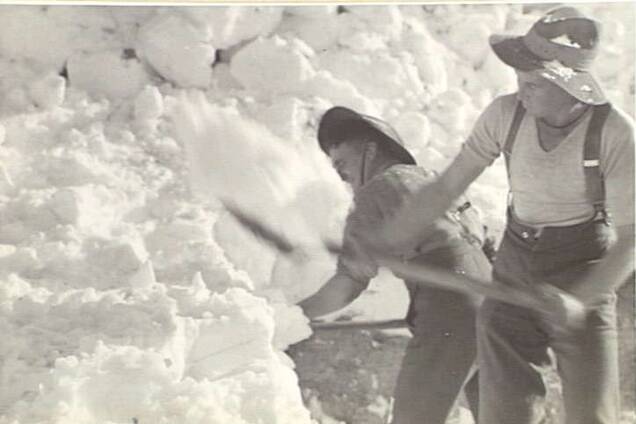 SHOVELLING SNOW IN SYRIA: Members of the 2/3 Battalion clearing snow in 1942.
