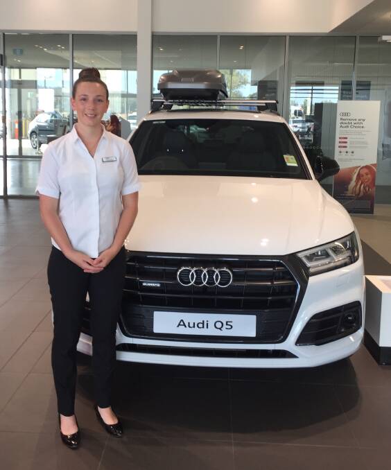 PROUD: Cassandra Flemming says Audi New England is a small, family owned dealership, 'that’s what I love about us'. The dealership, in Belmore Street, opened in 2013.