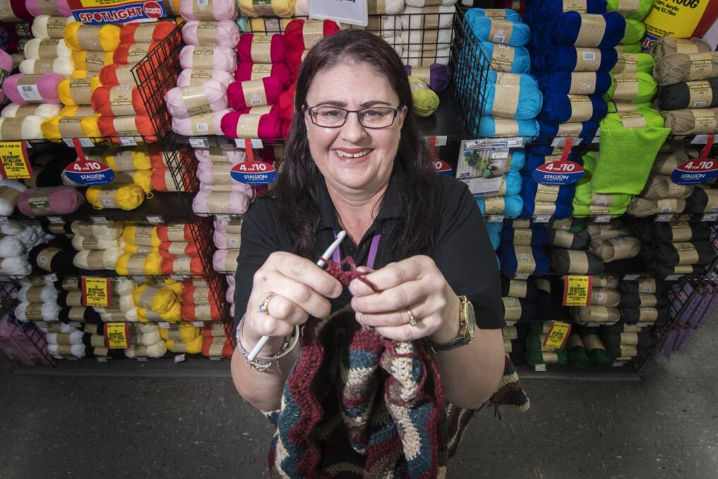 Wooly good cause: Spotlight's Karen Amos and some other knitting ninjas will be on hand to help those wishing to just publically knit in for the cause. Photo: Peter Hardin