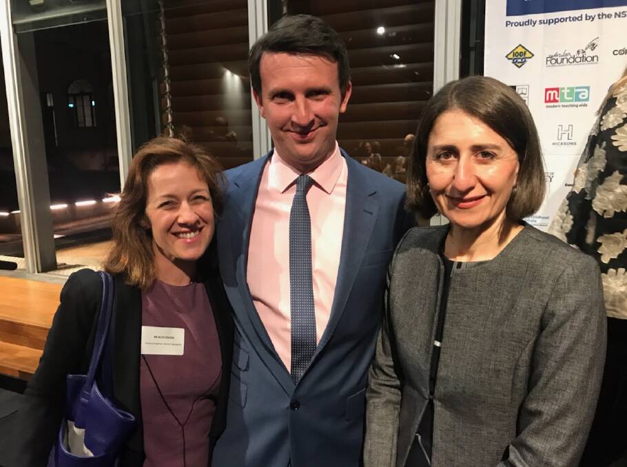 Calrossy's Stephen Lawson flanked by his partner Alice Cohen and NSW premier Gladys Berejiklian at the Teachers Award's ceremony in Sydney.