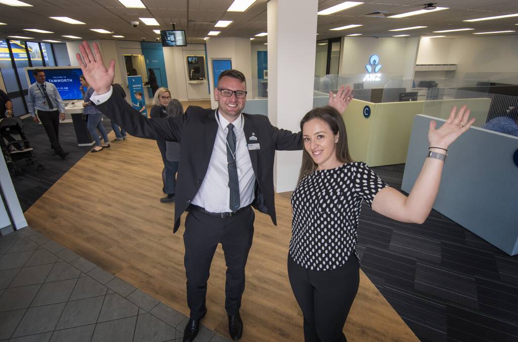 Bank new world: Jason Johnson and Amanda Ramplin throw the doors open after ANZ underwent an eight week digital makeover. Photo: Peter Hardin