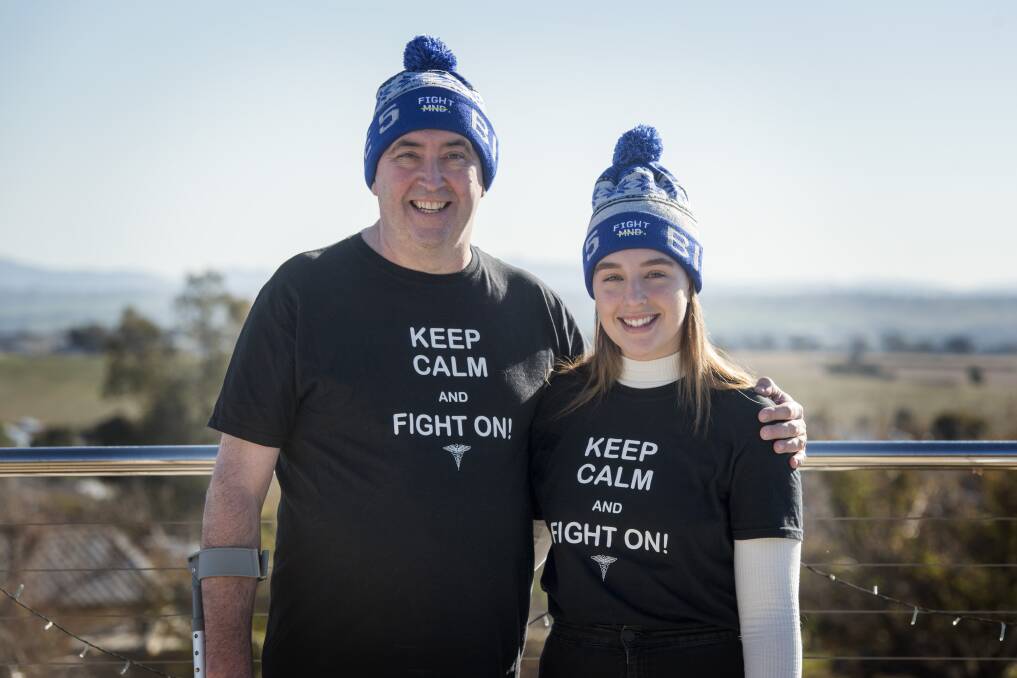 Run at it: David and Lauren Healey are taking his diagnosis head on. Photo: Peter Hardin