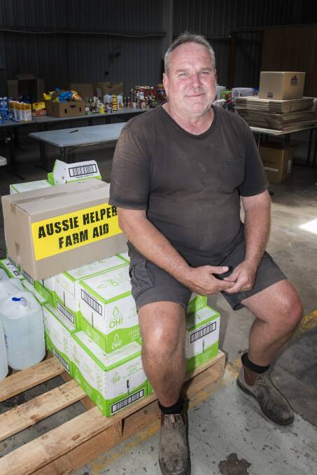 Helping hand: Aussie Helper's coordinator Peter Fanning was "blown away" after Agquip organisers donated 400 hay bales to local farmers. Photo: Peter Hardin