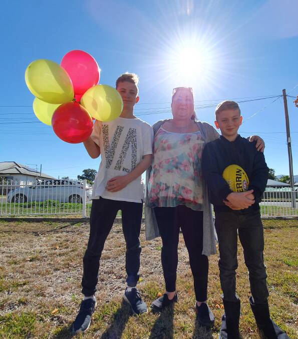 Lonely mission: Ashley, Carlie and Ethan Howcroft are hosting a Meet and Greet day on Thursday for people to meet, chat and join the community. Photo: Chris Bath