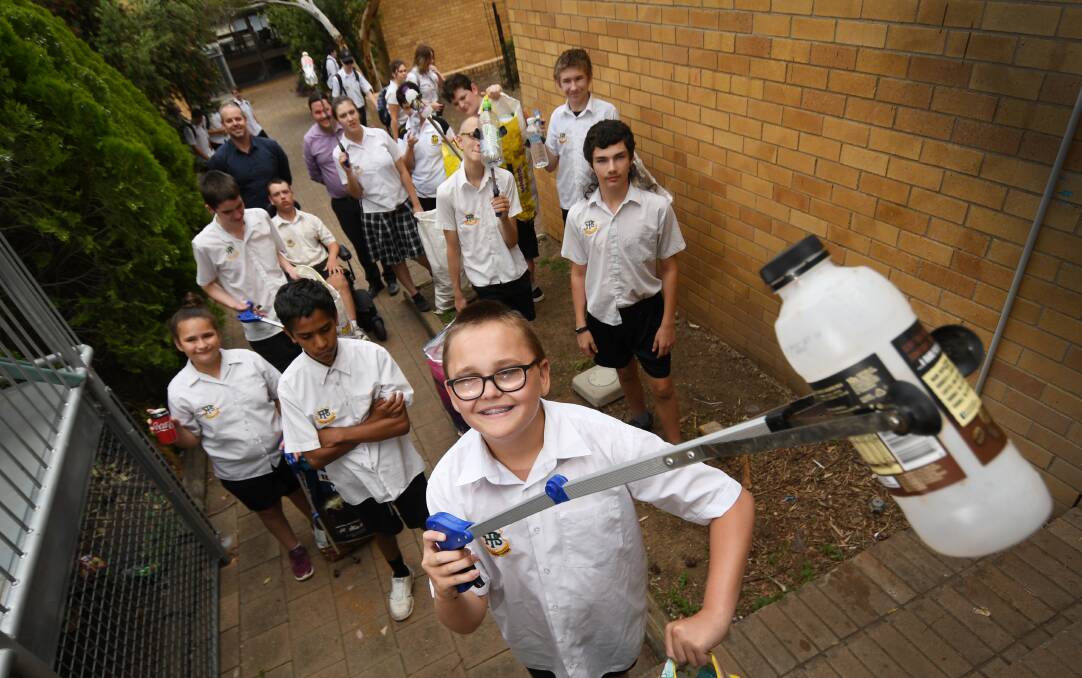 Sustainable squad: Jayden Grainger and his clean up colleagues in Peel High's Support Unit have collected over 16,000 containers. Photo: Gareth Gardner