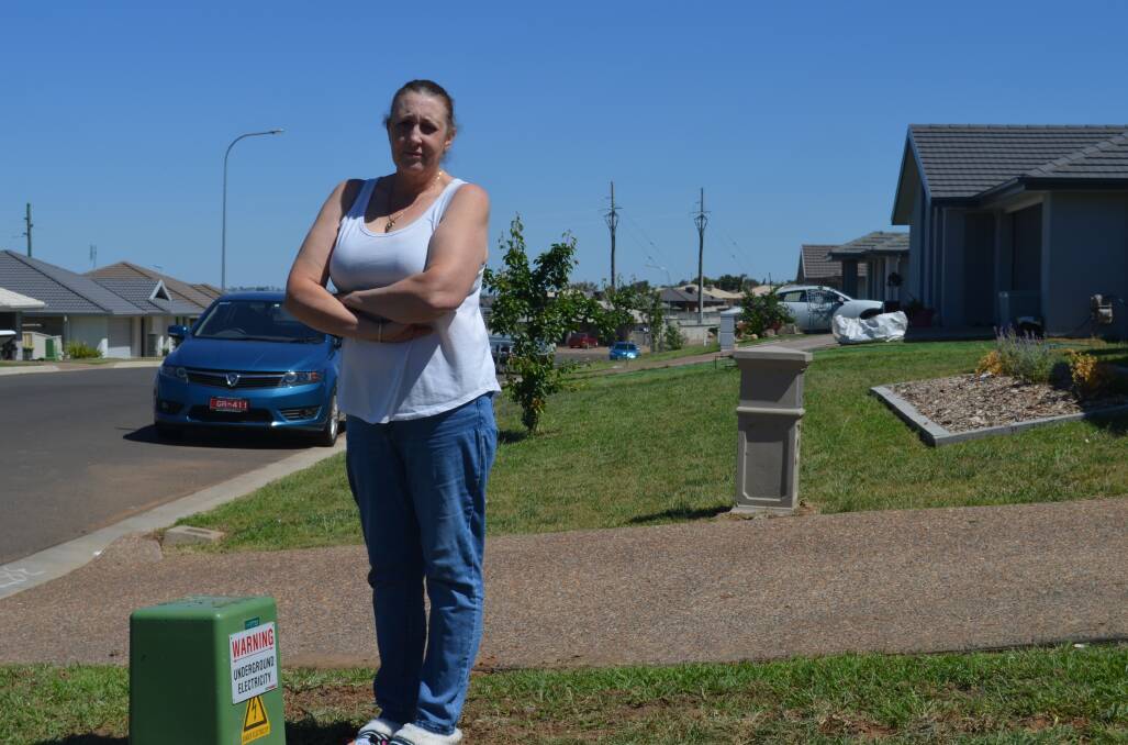 Grassed off: Maxine Peters is fuming after the telecommunications box at her new Oxley Vale residence was turfed over leaving her in a black spot for over two months.