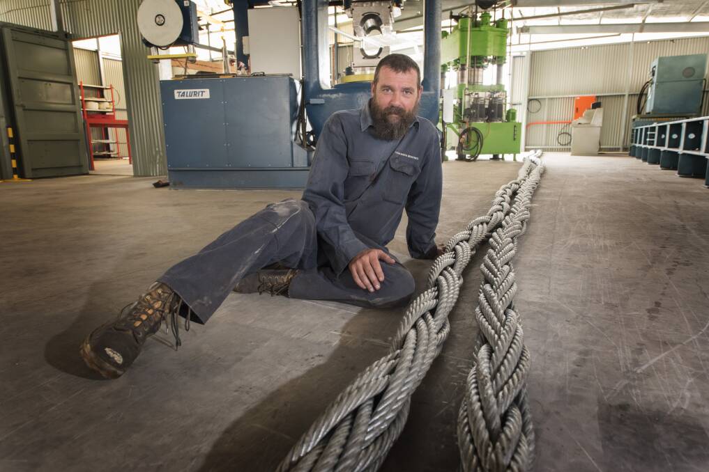 Heavy history: Andromeda Industries' Mark Simpson with the two woven strops to be used for a record-making 300 tonne industrial lifting operation. Photo: Peter Hardin 130519