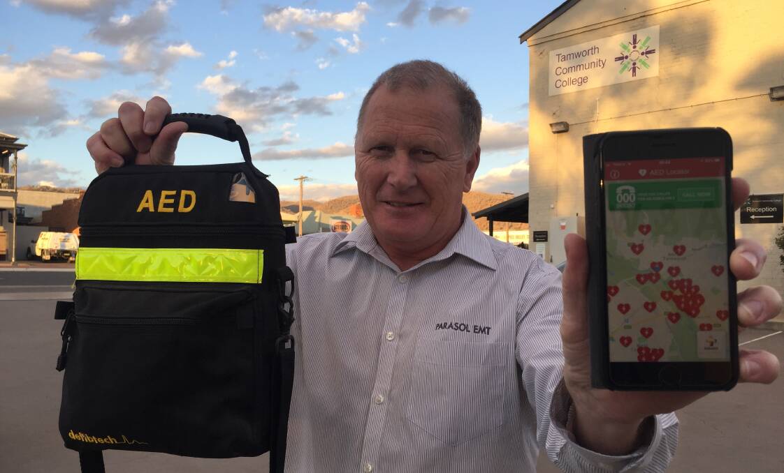 Life-saver: Tamworth paramedic and Parasol EMT instructor Ian Chapman and his wife Geraldine designed the free AED Locator app which aims to give people the best chance at survival in an emergency. Photo: Chris Bath 120718