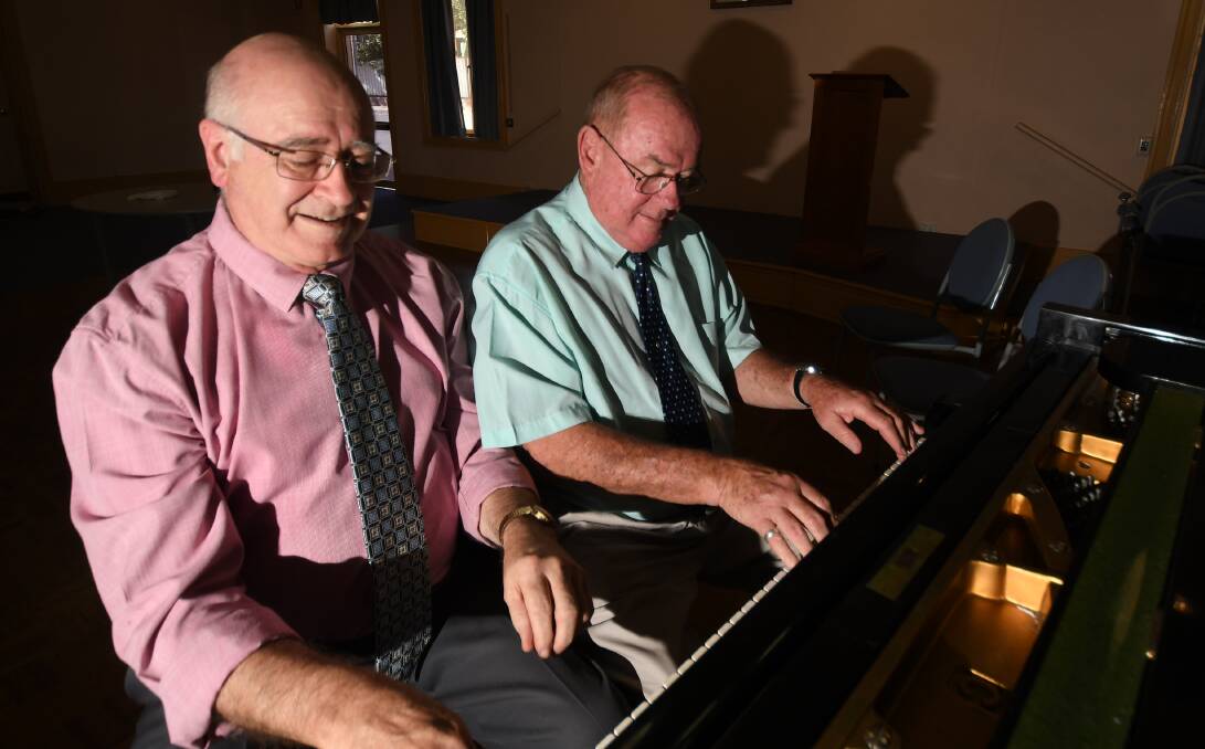 Tinklin together: Richard Hutt and Bill Gleeson have played their final show as Two Men and Two Pianos. Photo: Gareth Gardner