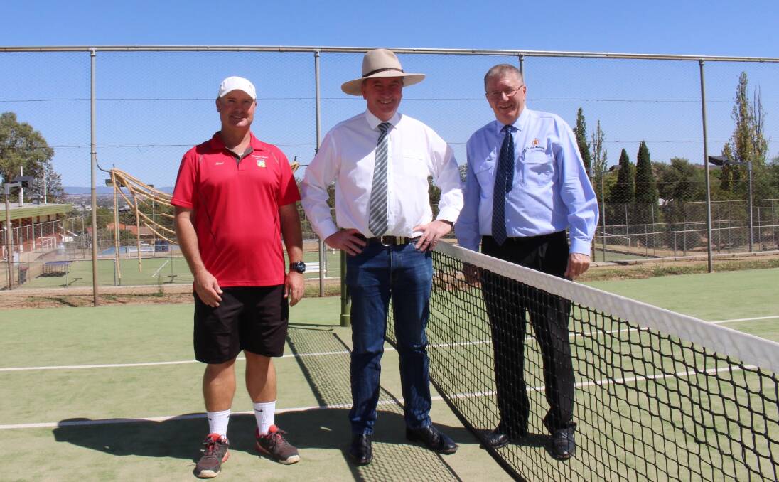 Ace: North West Tennis Academy's Jarrod Campbell, Barnaby Joyce and Col Murray on one of nine courts to be upgraded to hardcourt at the Tamworth Tennis Club. 