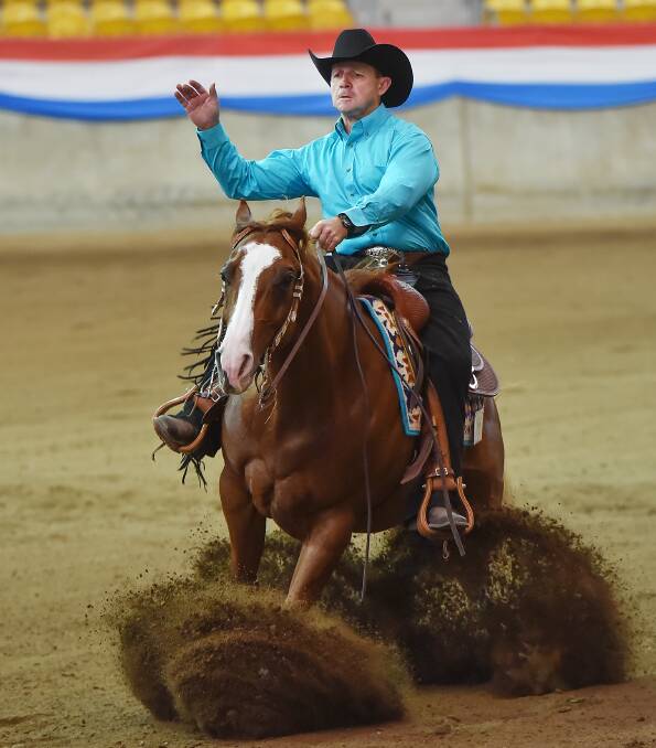 Don't ride, slide: Tony Prise slides to a stop during the Reining National Championships Non Pro at the AELEC on Saturday. Photos: Gareth Gardner 240916GGB