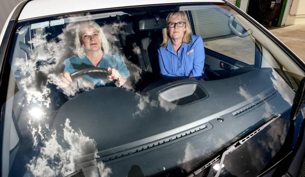 Clouded: Oxley Community Transport's Sharon Tibbs and Kylie O'Leary say a change of interpretation has led to uncertainty in the industry. Photo: Gareth Gardner 120319GGC02