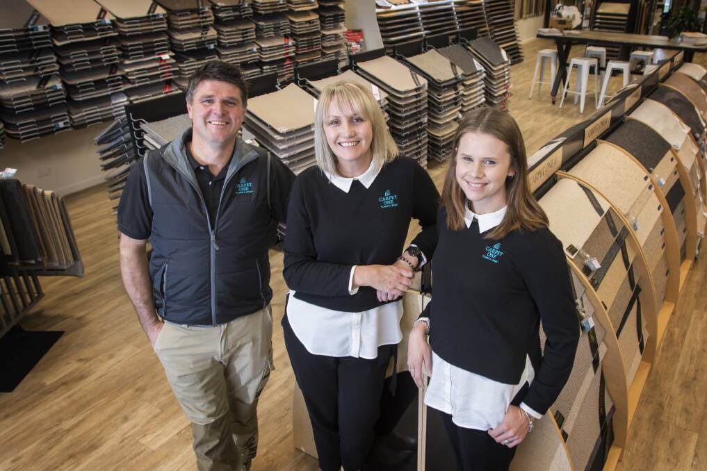 Magic carpet ride: Owners Dan and Nadine Daly, with 'boss' Michelle Lewington are excited to be part of the 2018 Quality Business Awards. Photo: Peter Hardin
