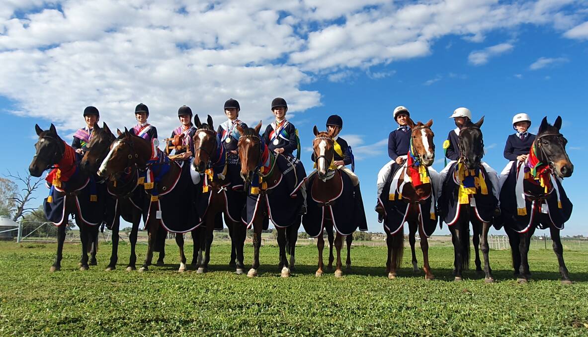 Ribbons galore: The Calrossy equestrian team produced a range of winners and runners-up at the North West Equestrian Expo in Coonabarabran. Photo: Chris Bath 130619