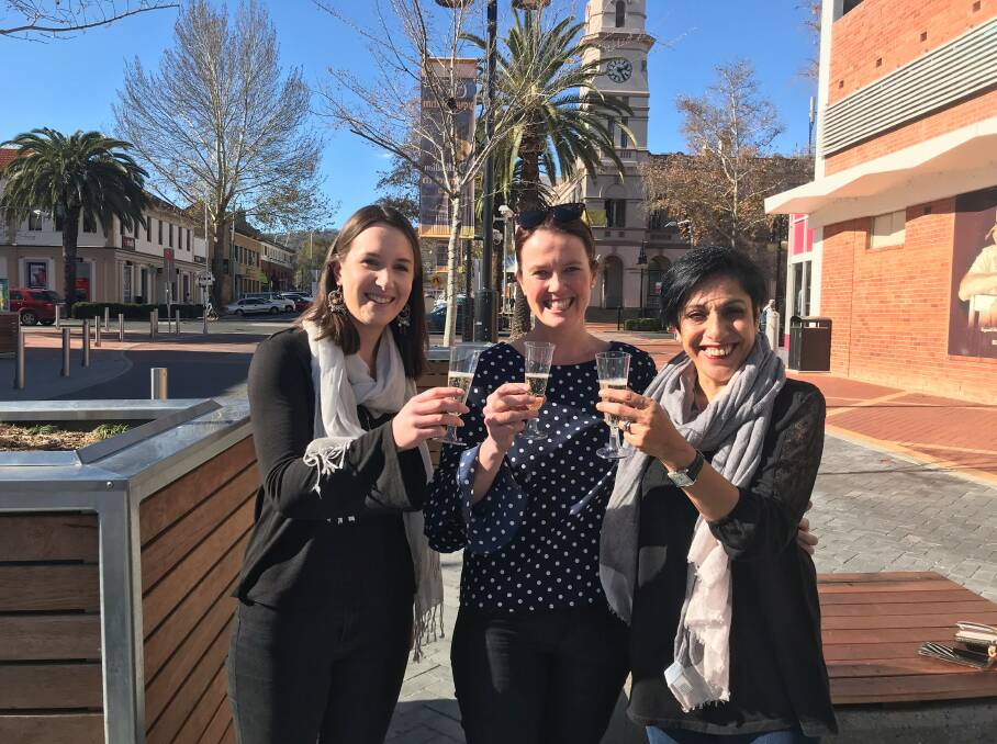 Celebrate success: The Chamber's Awards team of Bec Amon, Jill Stewart and Mary Ryan-Garnett raise a toast after a record breaking second year of Business Award ticket sales.