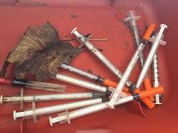 Out of control: Hundreds of used syringes are being found at the Narrabri recycling plant.