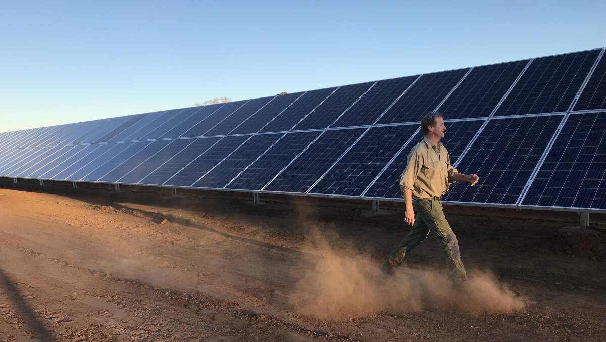 Pumped up: Narromine cotton farmer Jon Elder inspects the countries largest solar diesel hybrid pump which was installed by Tamworth company ReAqua and has already halved his annual diesel consumptin of 350,000 litres.