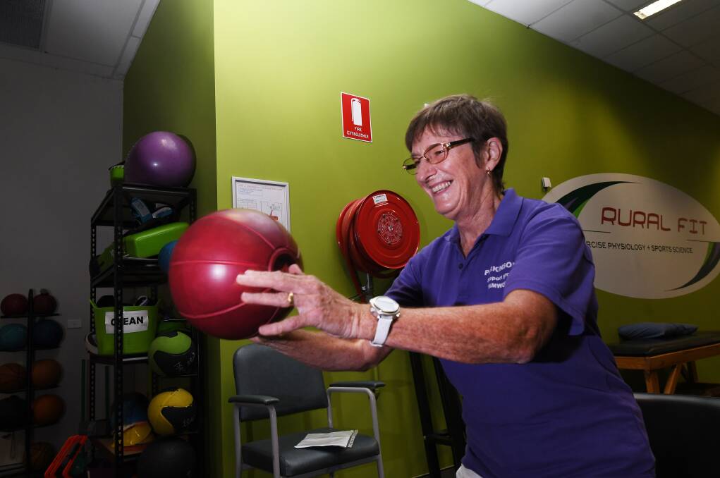 Moving and shaking: Jenni Fergus almost completely controls her Parkinson's symptoms through a strict exercise program and a sharp sense of humour. Photo: Gareth Gardner