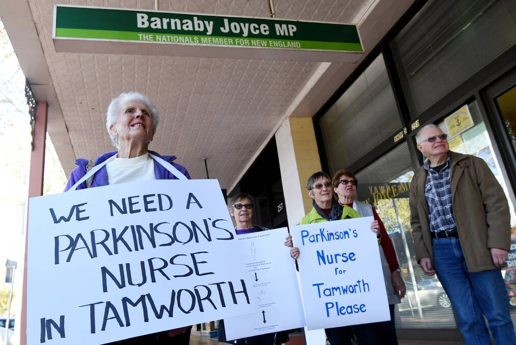 Nursing need: Near 30 supporters with placards arrived at Barnaby Joyce's office as the Neuro Nurse campaigners met with Rural Health Minister Bridget McKenzie. Photo: Gareth Gardner