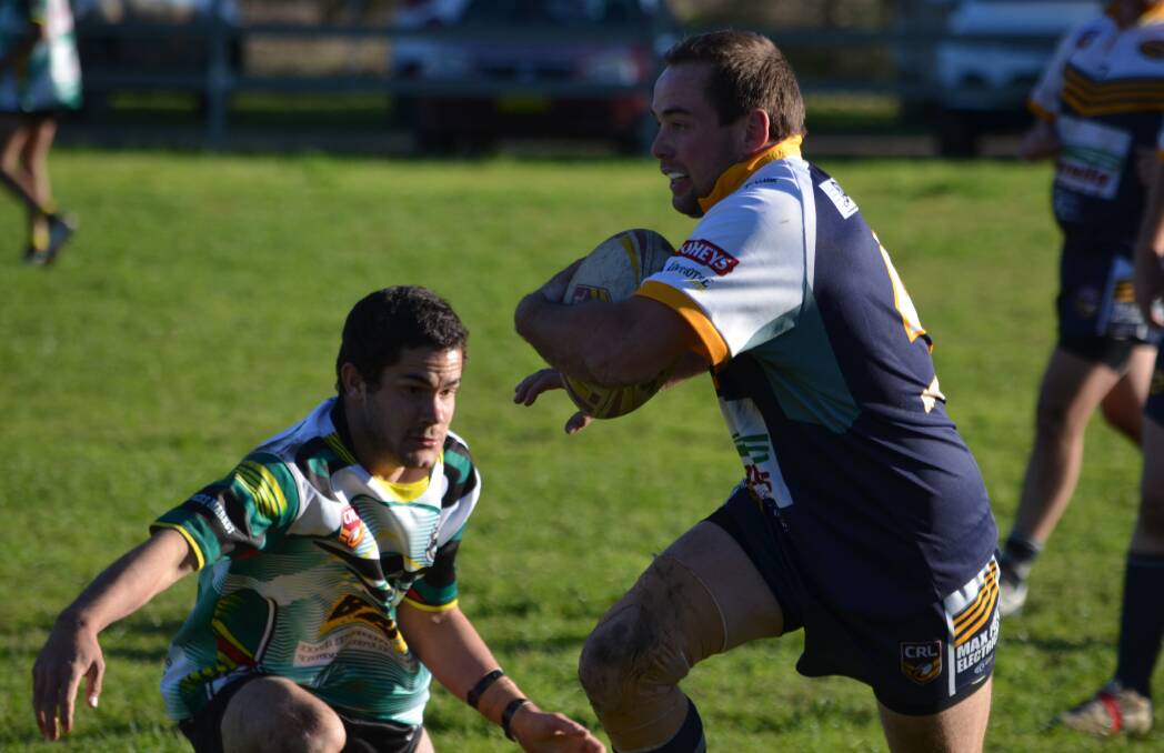 Round-up: Wee Waa fullback Scott Spencer looks to go low on four-try Dungowan hero Mitch Brown. The fourth-placed Cowboys will meet third-placed Uralla. 
