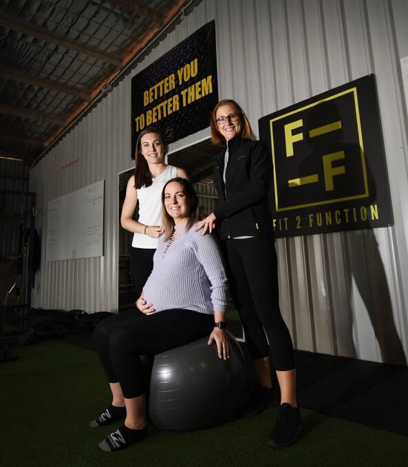 Baby business: Brooke Carrington and Jess Walker go through some techniques with  Vanessa Flett ahead of the inaugural Baby Expo. Photo: Gareth Gardner