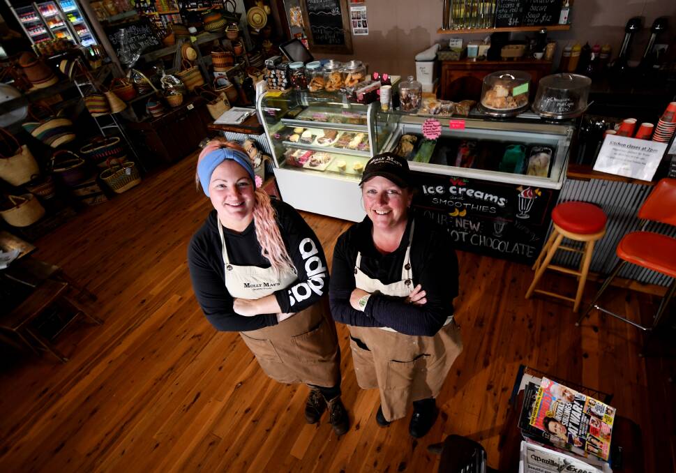 Destination flavour: Kirra Sevil and Catherine Northey serving up some friendly faces at the award winning Molly May's. Photo: Gareth Gardner 050619