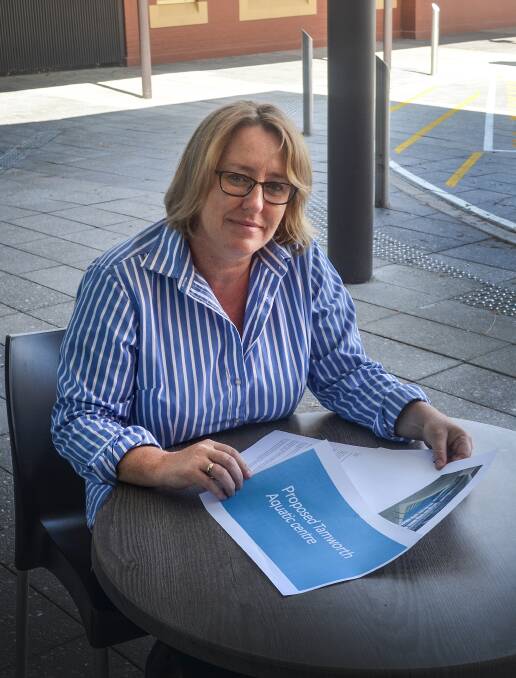 What's the hold-up: Tamworth Aquatic Group member Michelle Bolte puts some finishing touches on the group's submission to council. Photo: Chris Bath