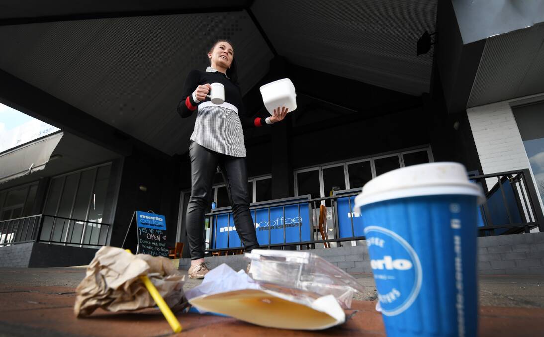 Coffee fuelled clean-up: Cafe 2340 owner Samantha Szyc is offering free coffee to anyone who picks up a bucket of rubbish from the street, while also going completely plastic free for the month of July. Photo: Gareth Gardner