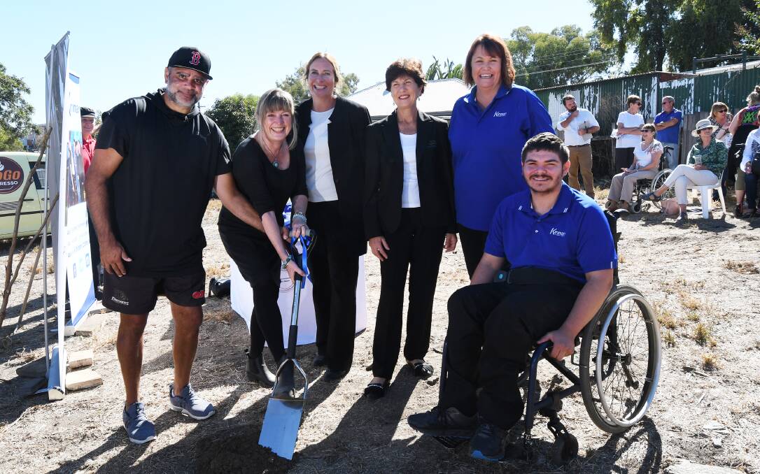 Digging deep: Nathan Blacklock, Lorraine Legge, Di Lynch, Helen Tickle, Julia Reilly and Solomon Noon turn the first sod on the new Specialist Disability Accommodation site on Bligh Street. Photo: Gareth Gardner