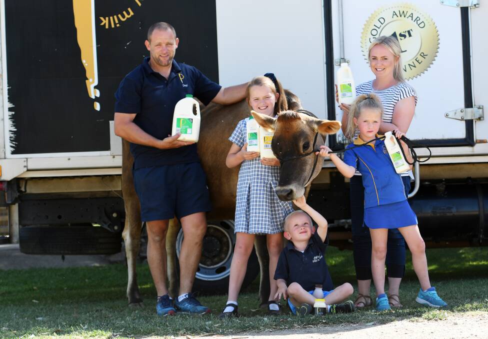 Family affair: Local dairy farmers Todd and Sarah Wilson have taken over Woolomin's Peel Valley Milk brand along with the sixth generation of Wilson dairy farmers Ella, Koby, and Marlie. Photo: Gareth Gardner 011117
