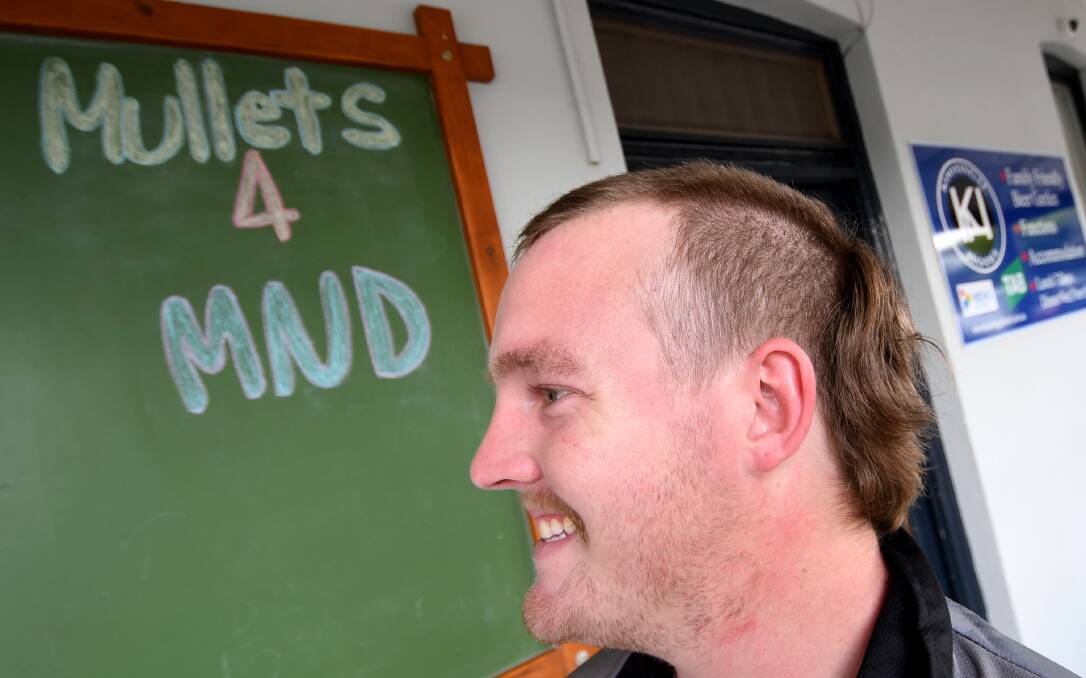 Real contender: Jake Mann is an early front runners, or back runner, to win the ultimate mullet award at the Kooty Pub's Mullets for MND. Photo: Gareth Gardner