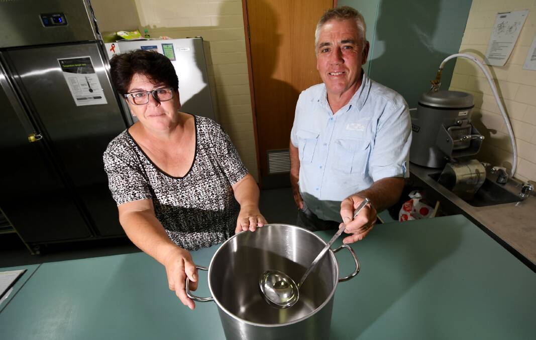 Pots empty: Cornerstone Kitchen chef Jenny Hatch and Minister Glenn Maybury are hungry for donations as the community service faces closure. Photo: Gareth Gardner 270319GD03