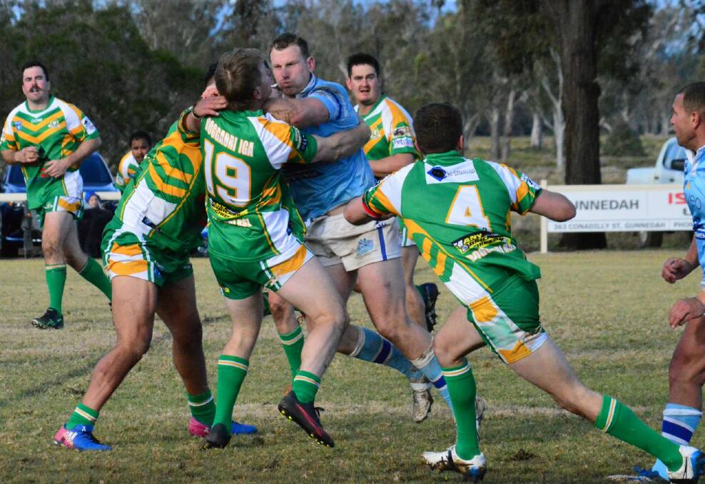ON THE CHARGE: Blues captain-coach Jake Rumsby takes a hit-up against Boggabri. Photo: Sue Haire