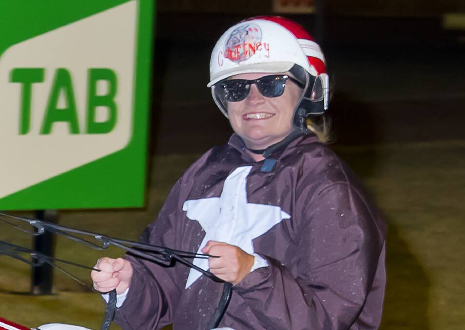 HAPPY: Courtney Sutherland and Big Beat from the Len Simon stables enjoying the win on Tuesday night. Photo: PeterMac Photography