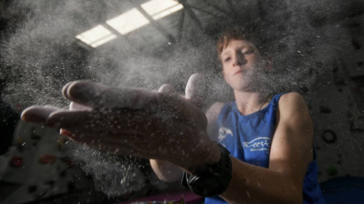 PROBLEM SOLVER: Fred Eather has been bouldering for five years and competed at the 2021 NSW Youth State Lead and Speed Titles on the weekend. Photo: Gareth Gardner