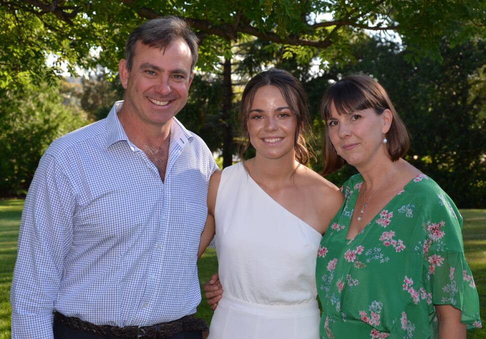 OVER THE MOON: Grace Cassidy will now be able to celebrate her graduation day with her parents Shaun and Cassy. Photo: Supplied