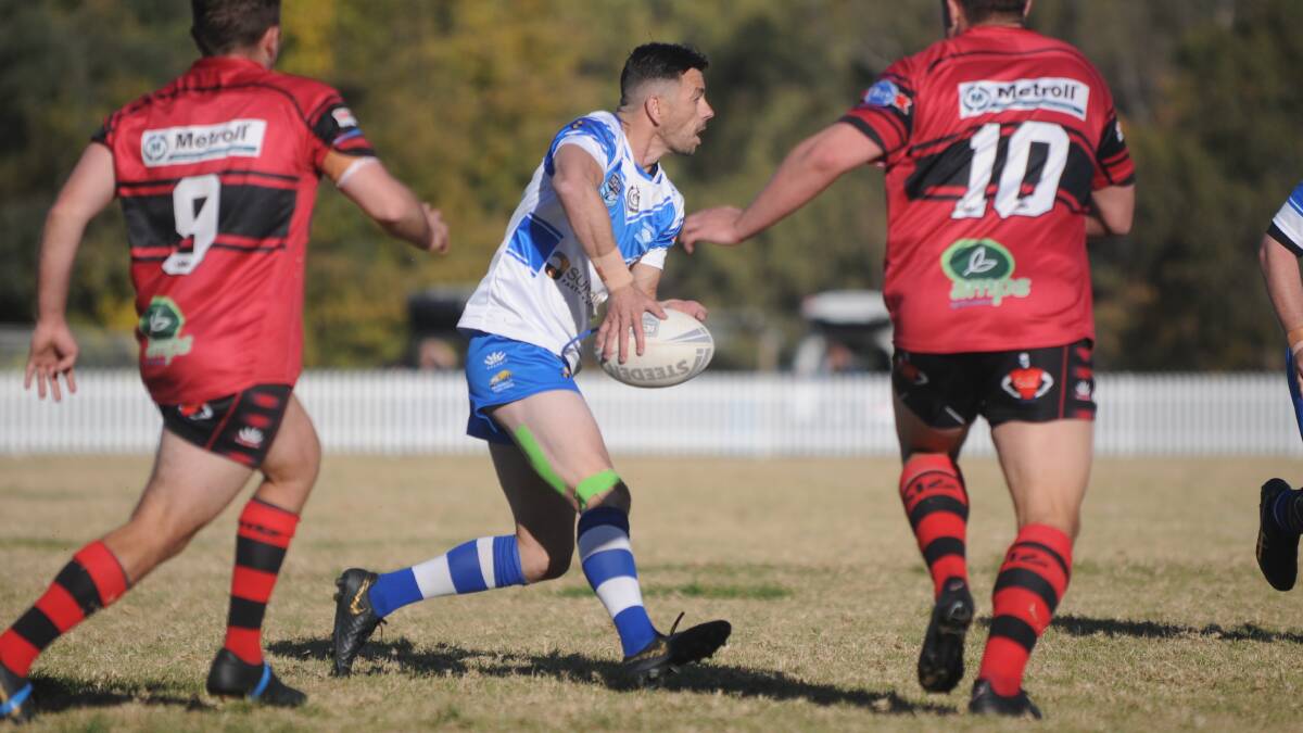 CLUTCH: Michael Watton, in action against North Tamworth, featured at the finish again for the Moree Boars. Photo: Mark Bode