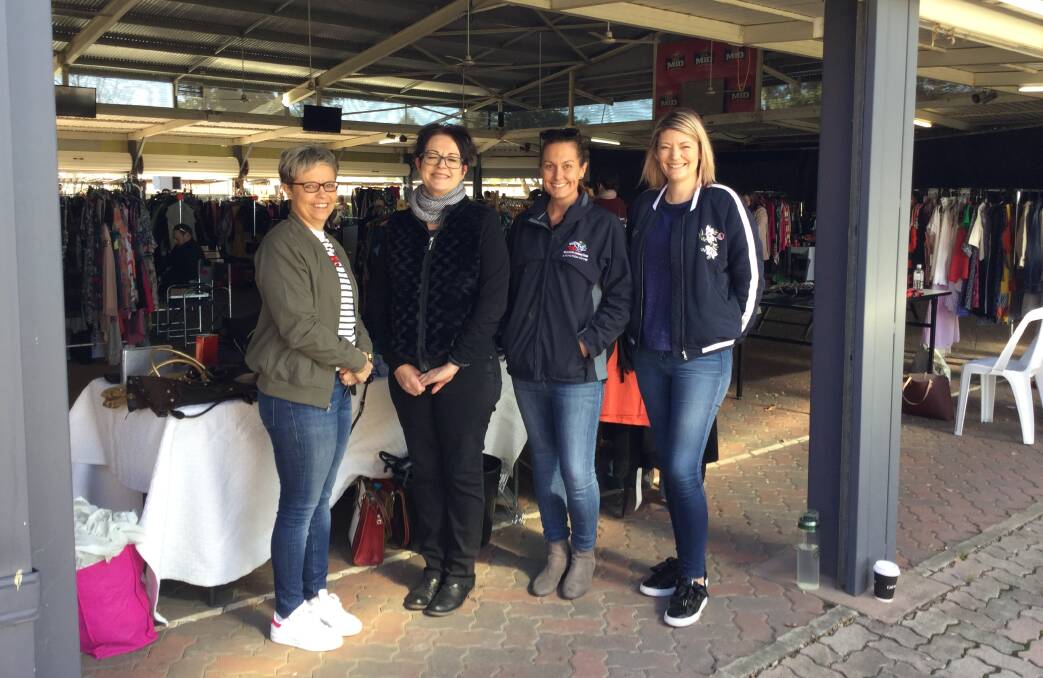 Cleaning out the closet at the Tamworth Jockey Club are (from left) Kylie Gillies, Tiffany Roworth, Amie Simpson and Shonnah Smith. Photo: Kim Newling and Westpac Rescue Helicopter Service