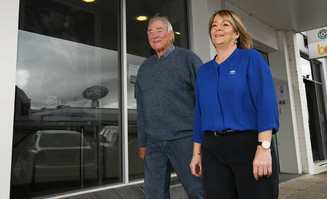 HELPING OUT: Men of League's Ron Surtees and NRMA regional manager Vicki Cox. Photo: Gareth Gardner