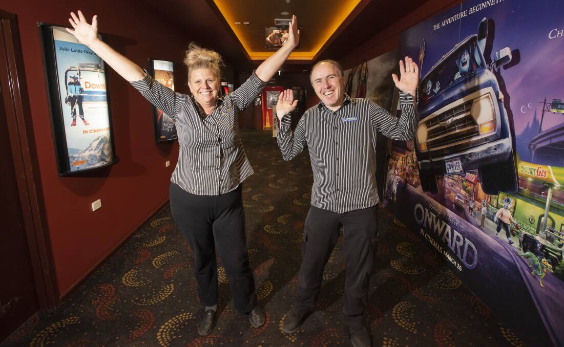 SUPPORT LOCAL: Jodie and Glen from Forum 6 want everyone to know the cinema is still open for business. Photos: Peter Hardin