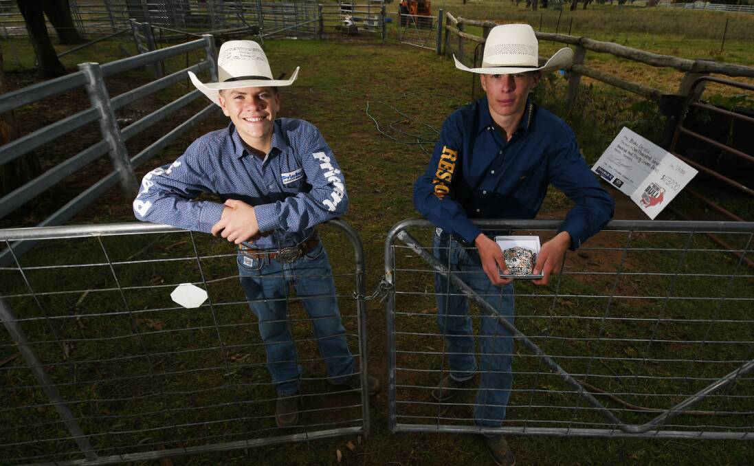 HOLD ON: Colby Edgar and Blake Christie competed at the Australian Mini Bull Championships. Photo: Gareth Gardner
