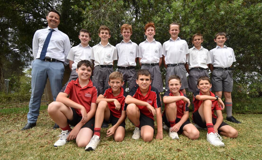 CHAMPIONS: The Carinya team that took out the Primary Christian School State Knockout competition with coach Josh Davis. Photo: Ben Jaffrey
