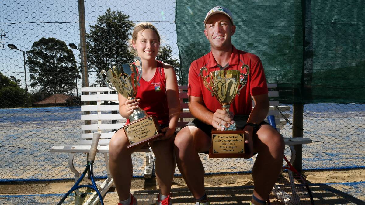 WINNERS: Daniel Nash and Kendra Fitzpatrick with their singles trophies. Photo: Gareth Gardner